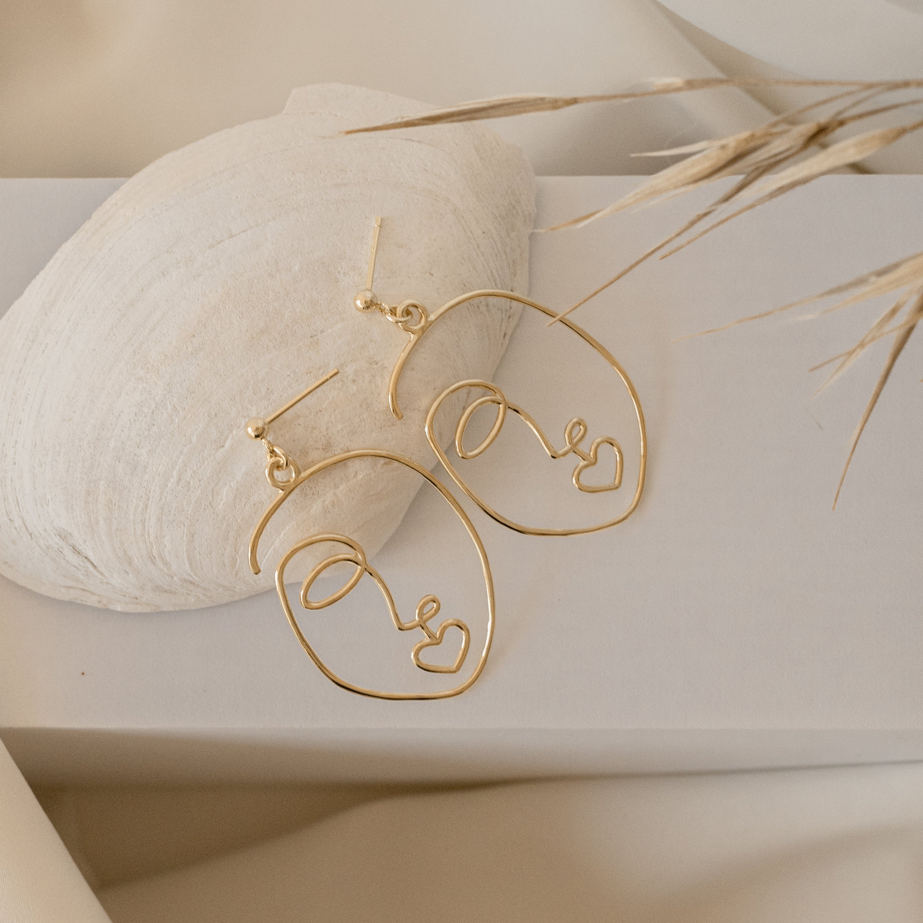 Ethereal Expressions: Abstract Face Earrings